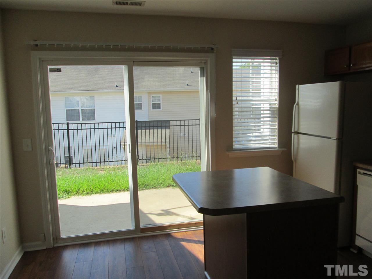 7706 River Field Drive Raleigh, NC 27616 - Photo 7 of 20 a view of kitchen and window