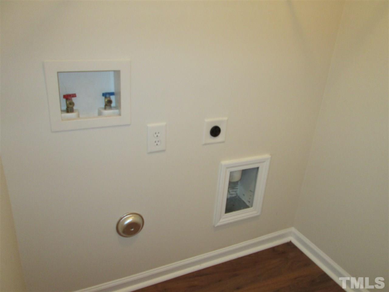 7706 River Field Drive Raleigh, NC 27616 - Photo 8 of 20 an empty room with a door