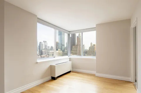 a large white room with a large window