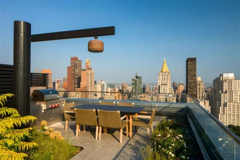 a view of swimming pool of outdoor seating yard