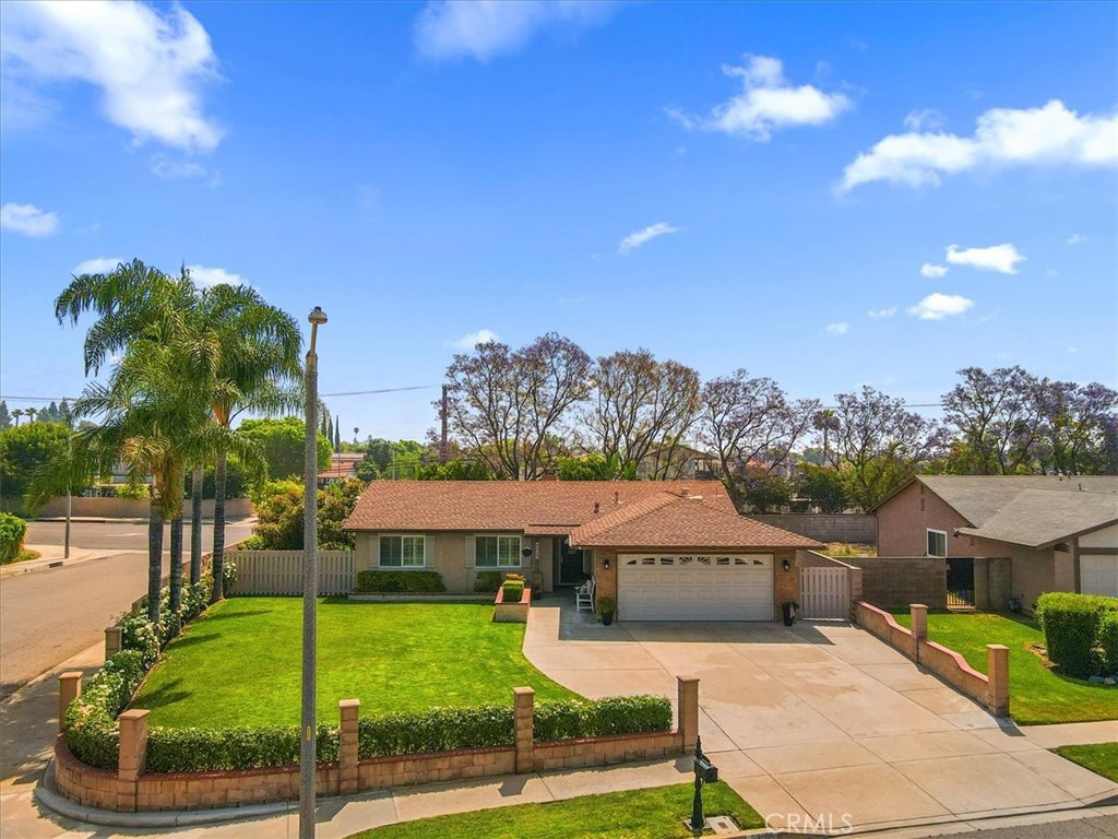 8313 Avenida Castro Rancho Cucamonga, CA 91730 - Photo 1 of 1 a front view of a house with garden