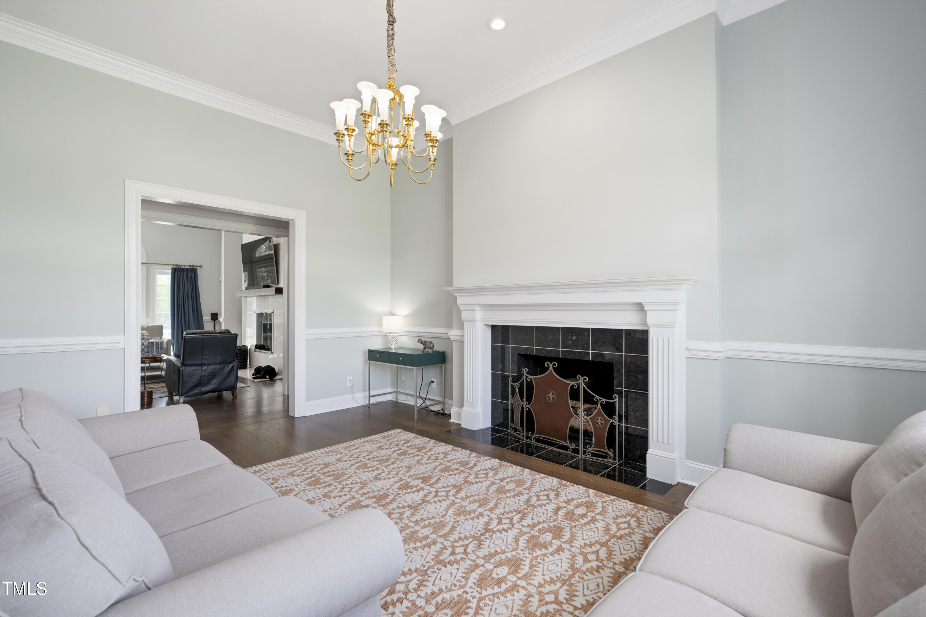 9820 Debnam Road Zebulon, NC 27597 - Photo 13 of 68 a living room with furniture and a fireplace