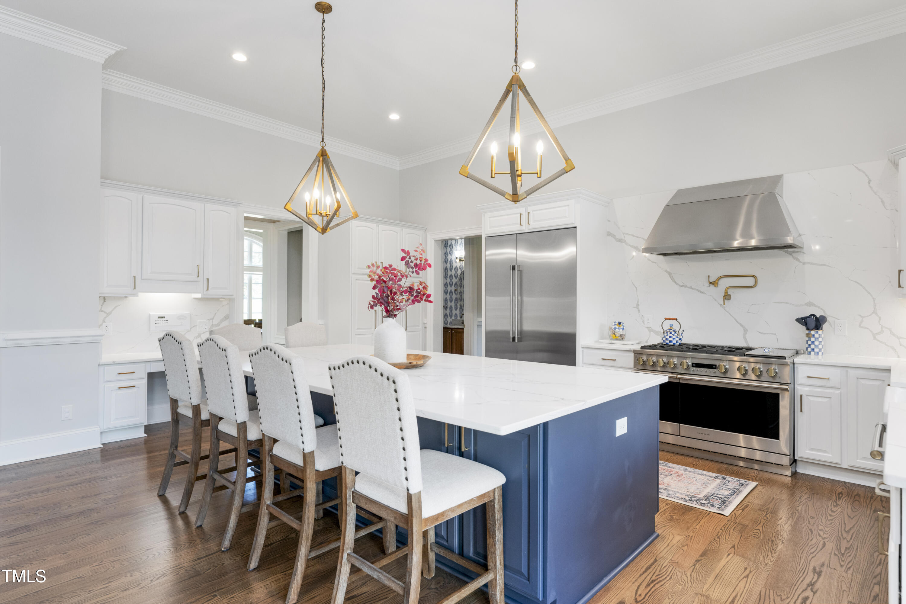9820 Debnam Road Zebulon, NC 27597 - Photo 20 of 68 a very nice looking kitchen with granite countertop a stove a sink a dining table and chairs