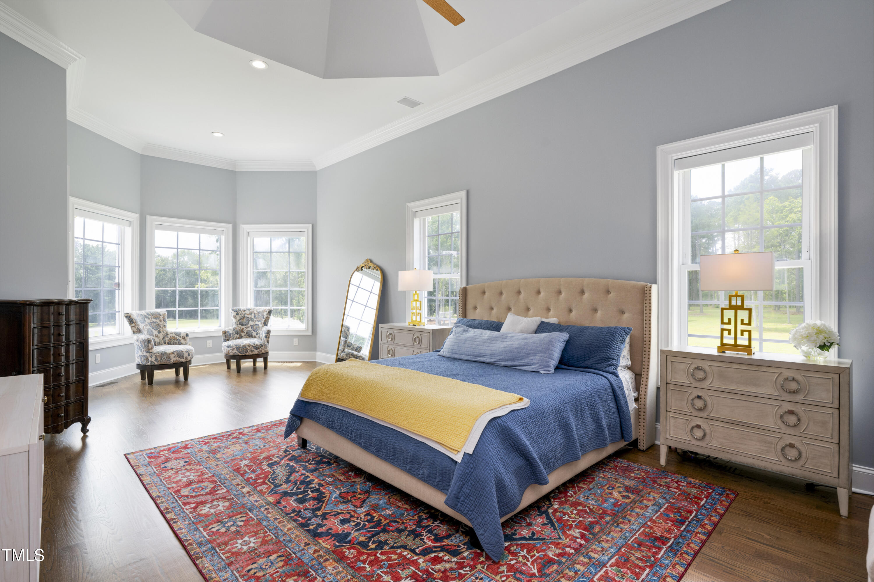 9820 Debnam Road Zebulon, NC 27597 - Photo 33 of 68 a bedroom with a large bed couch and a window