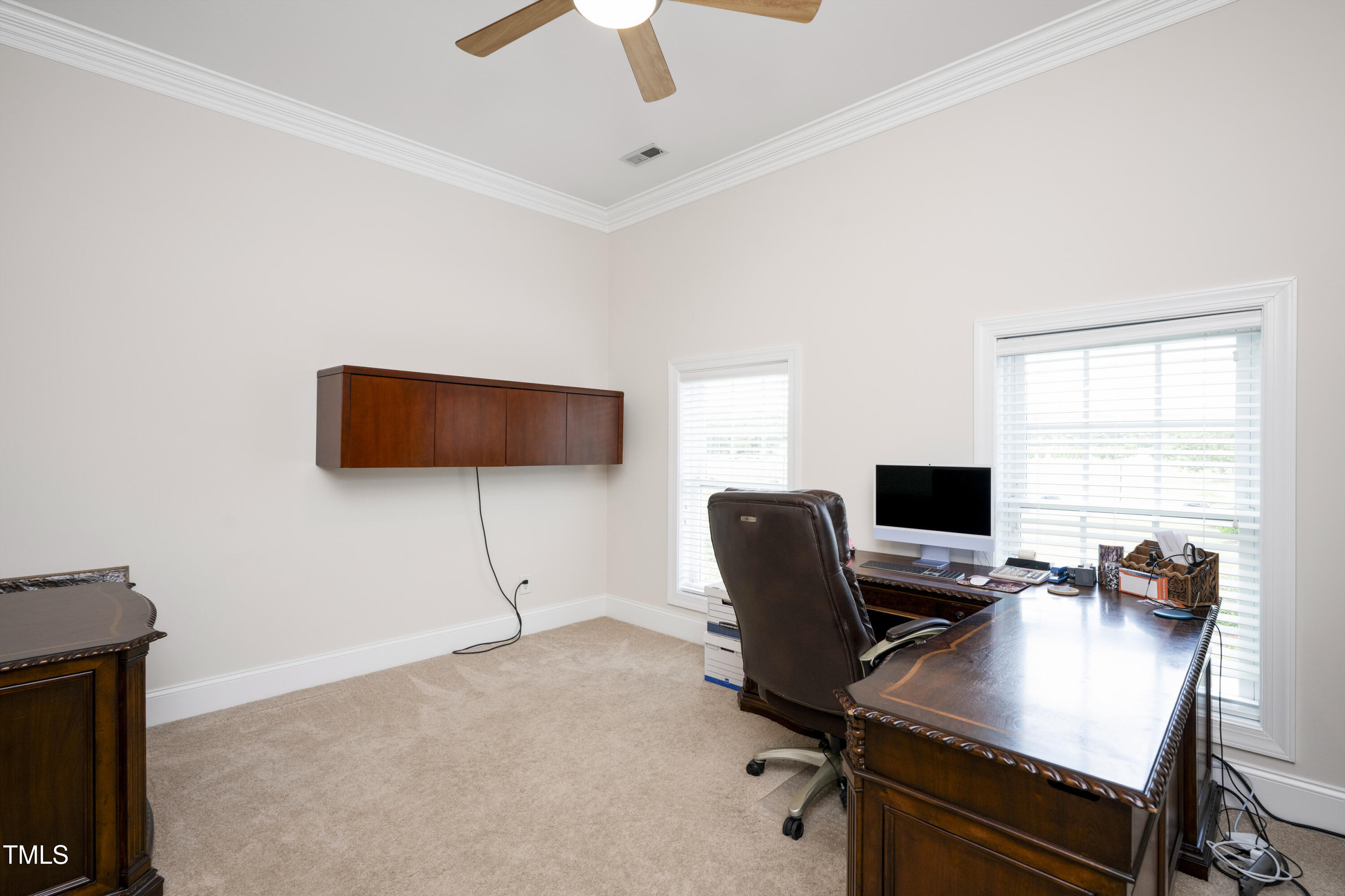 9820 Debnam Road Zebulon, NC 27597 - Photo 45 of 68 a view of a workspace with furniture