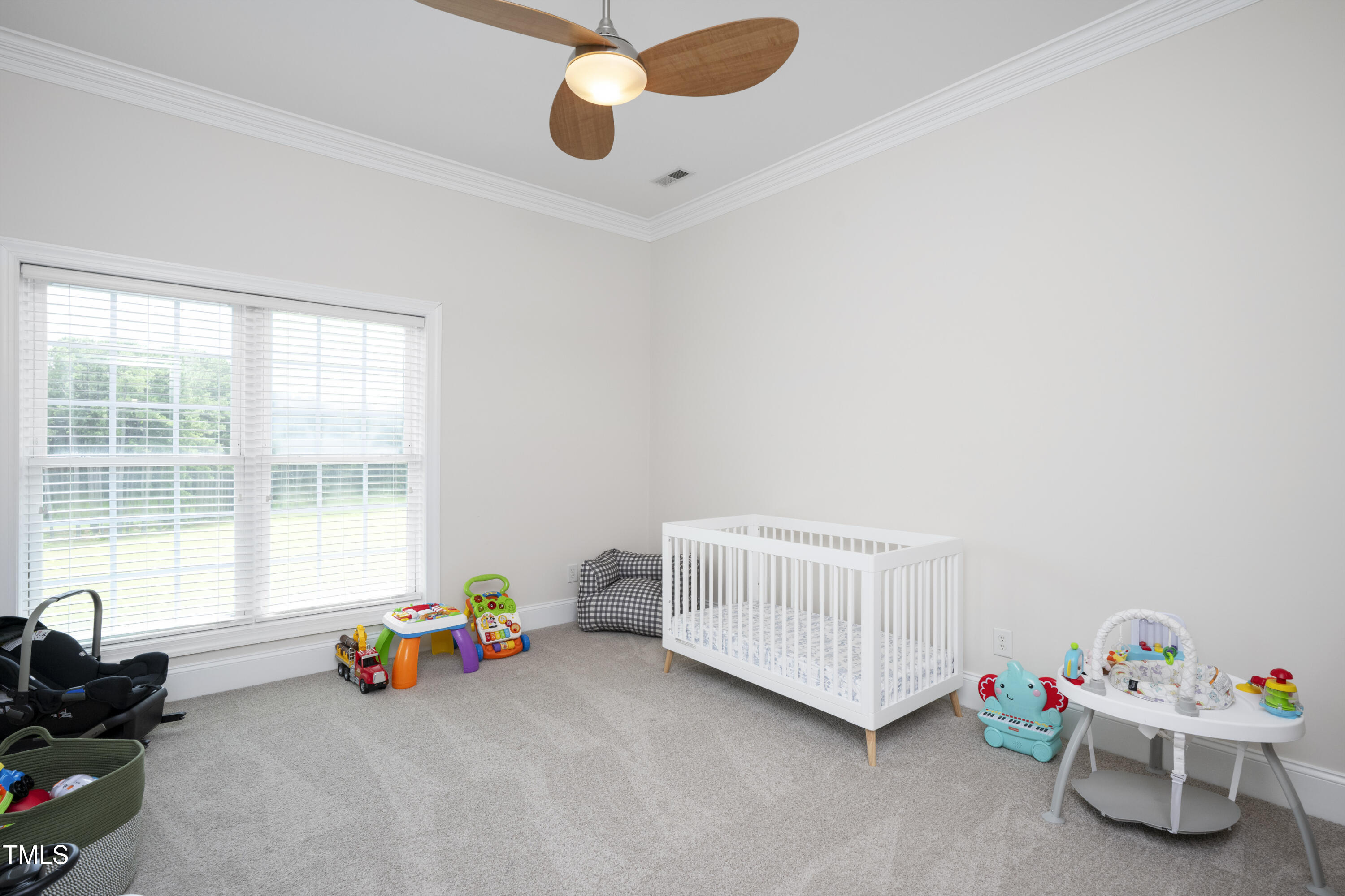 9820 Debnam Road Zebulon, NC 27597 - Photo 48 of 68 a room with toys and a chandelier