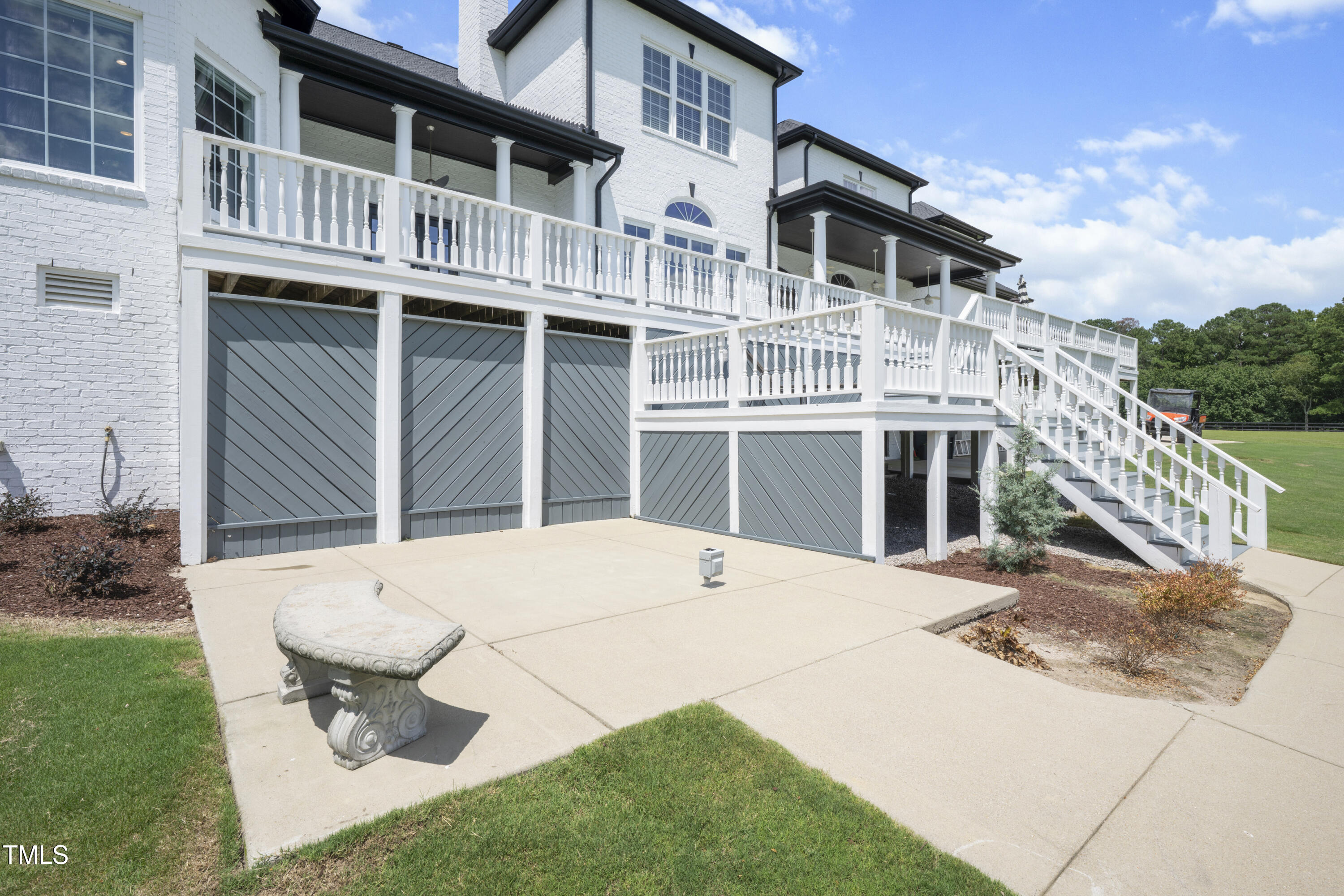 9820 Debnam Road Zebulon, NC 27597 - Photo 55 of 68 a white building with a outdoor space