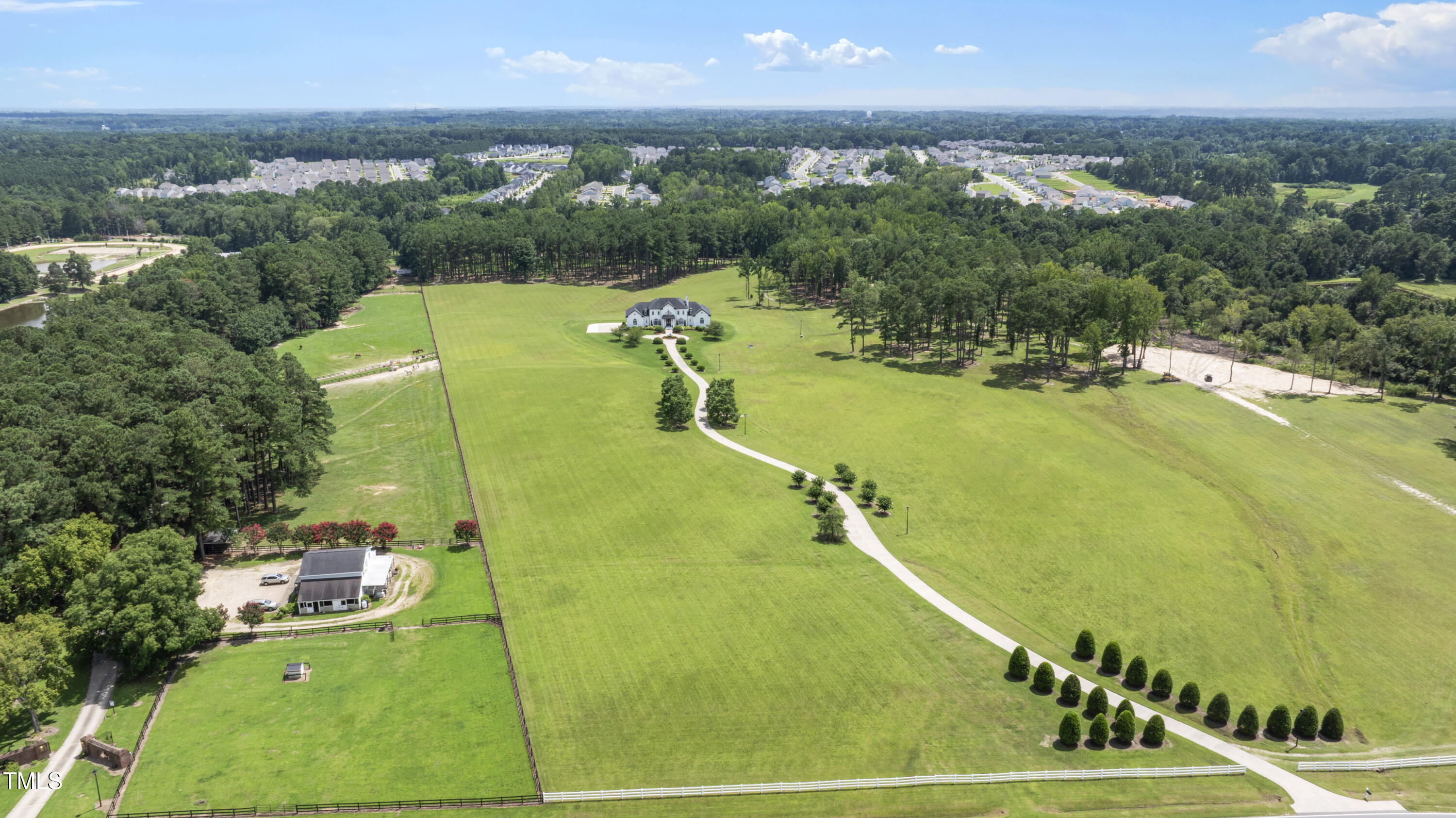 9820 Debnam Road Zebulon, NC 27597 - Photo 58 of 68 a view of a swimming pool and an outdoor seating
