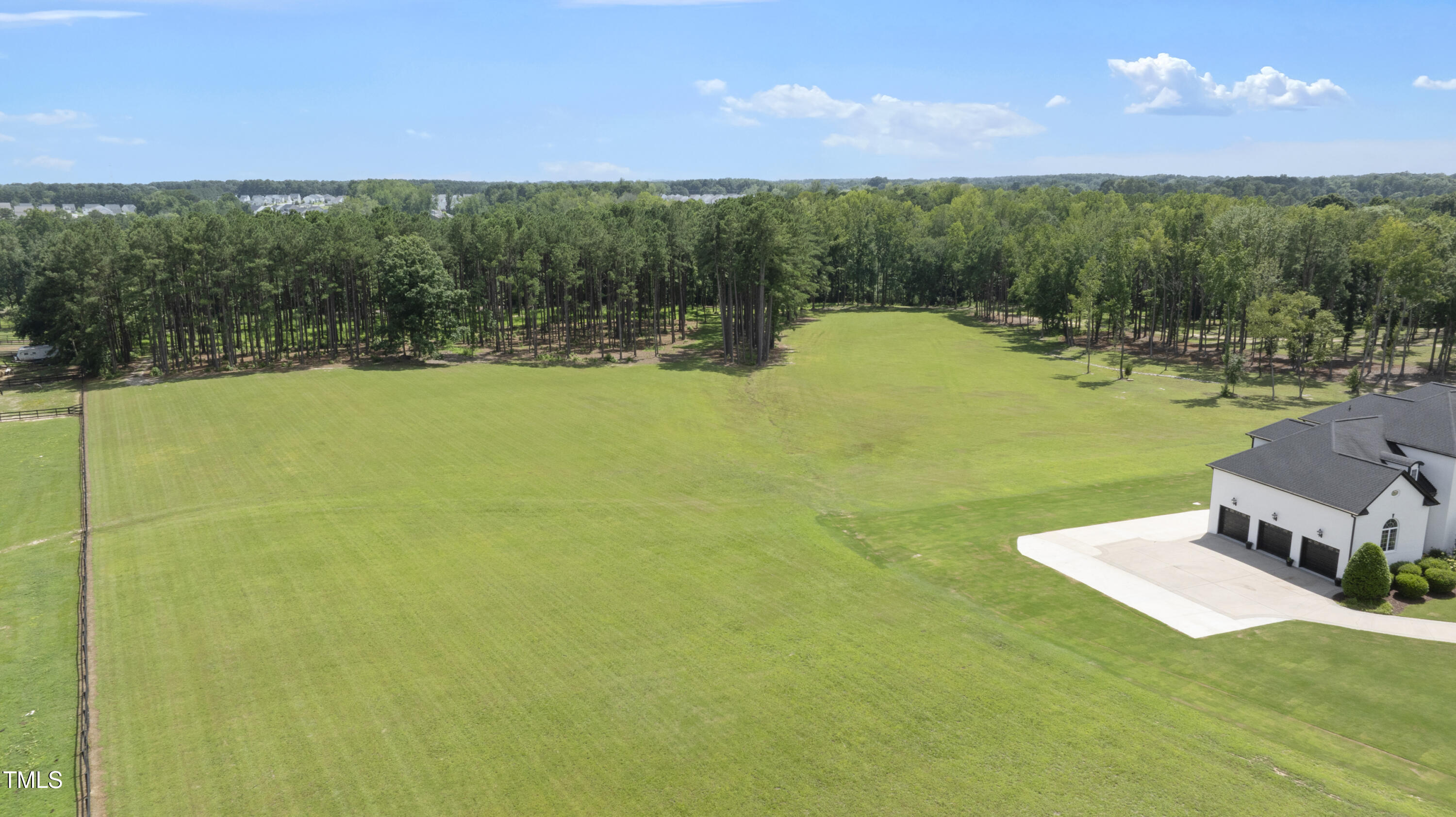 9820 Debnam Road Zebulon, NC 27597 - Photo 60 of 68 a view of a lake with a yard