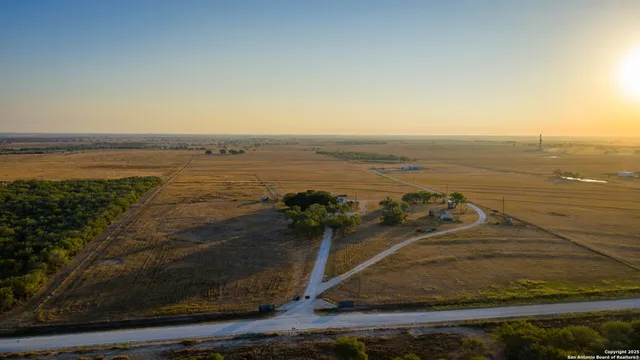 a view of a yard with a house
