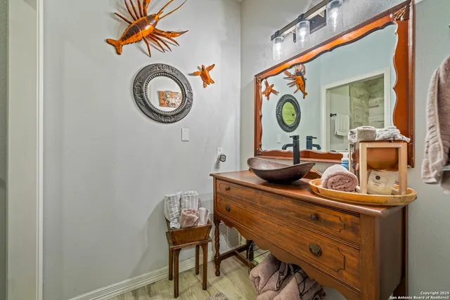 a bathroom with a toilet and shower