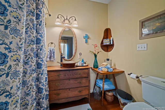 a living room with patio area and a ocean view