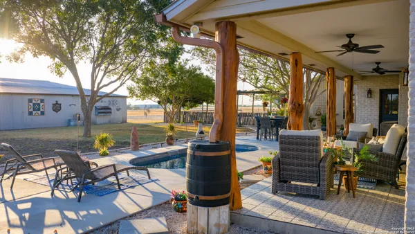 a view of a water fountain in front of a house