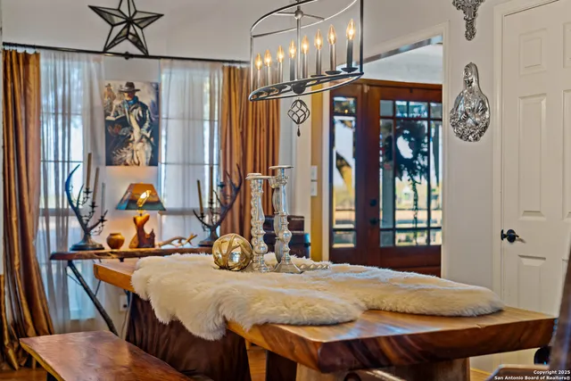 a bedroom with a bed and a table in it