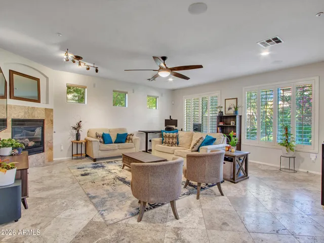 a house view with a sitting space and garden view