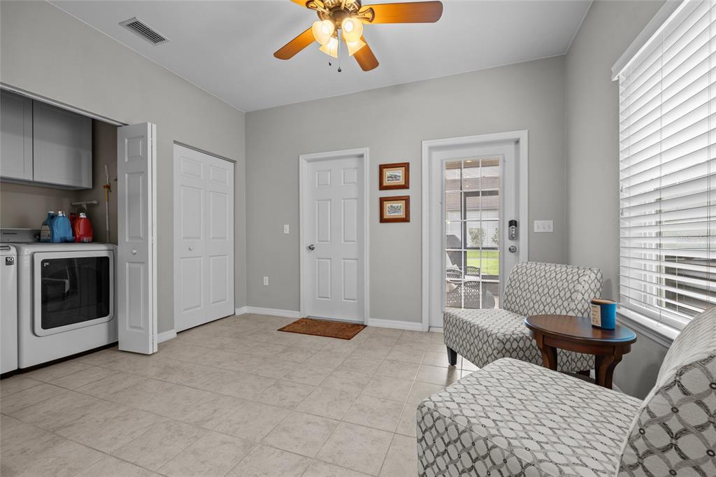 8251 Southwest 78th Lane Gainesville, FL 32608 - Photo 21 of 29 a living room with furniture and a fireplace