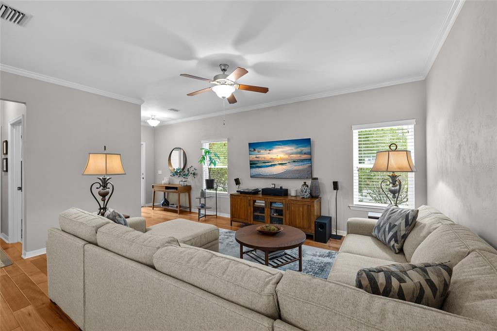 8251 Southwest 78th Lane Gainesville, FL 32608 - Photo 22 of 29 a living room with furniture and a flat screen tv