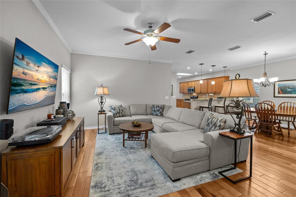 8251 Southwest 78th Lane Gainesville, FL 32608 - Photo 23 of 29 a living room with furniture and a flat screen tv