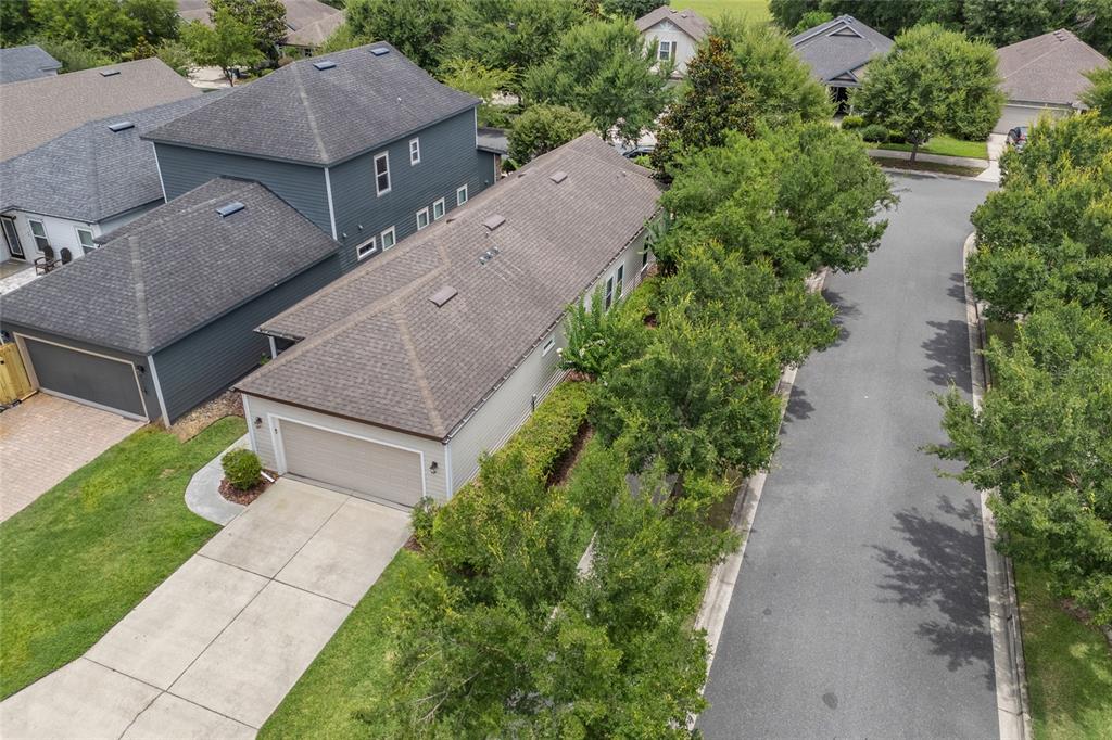 8251 Southwest 78th Lane Gainesville, FL 32608 - Photo 26 of 29 an aerial view of a house with a yard and greenery