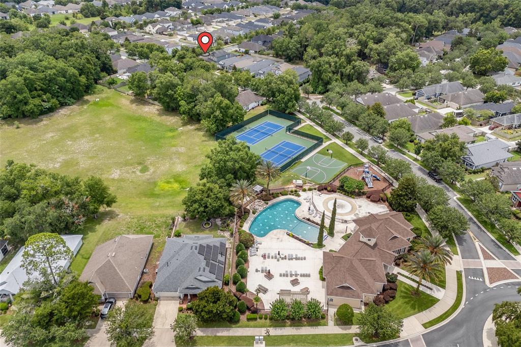 8251 Southwest 78th Lane Gainesville, FL 32608 - Photo 29 of 29 an aerial view of residential house with outdoor space and swimming pool