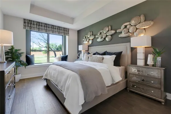 a bed room with a bed and a window