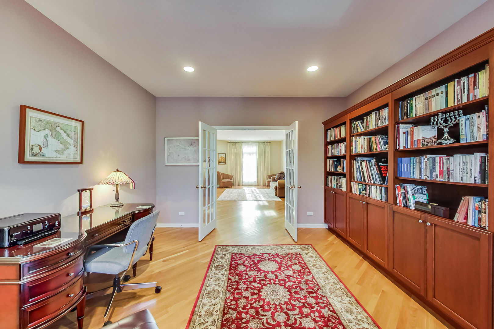 791 Endicott Road Highwood, IL 60040 - Photo 12 of 25 a hallway with a furniture and book shelf