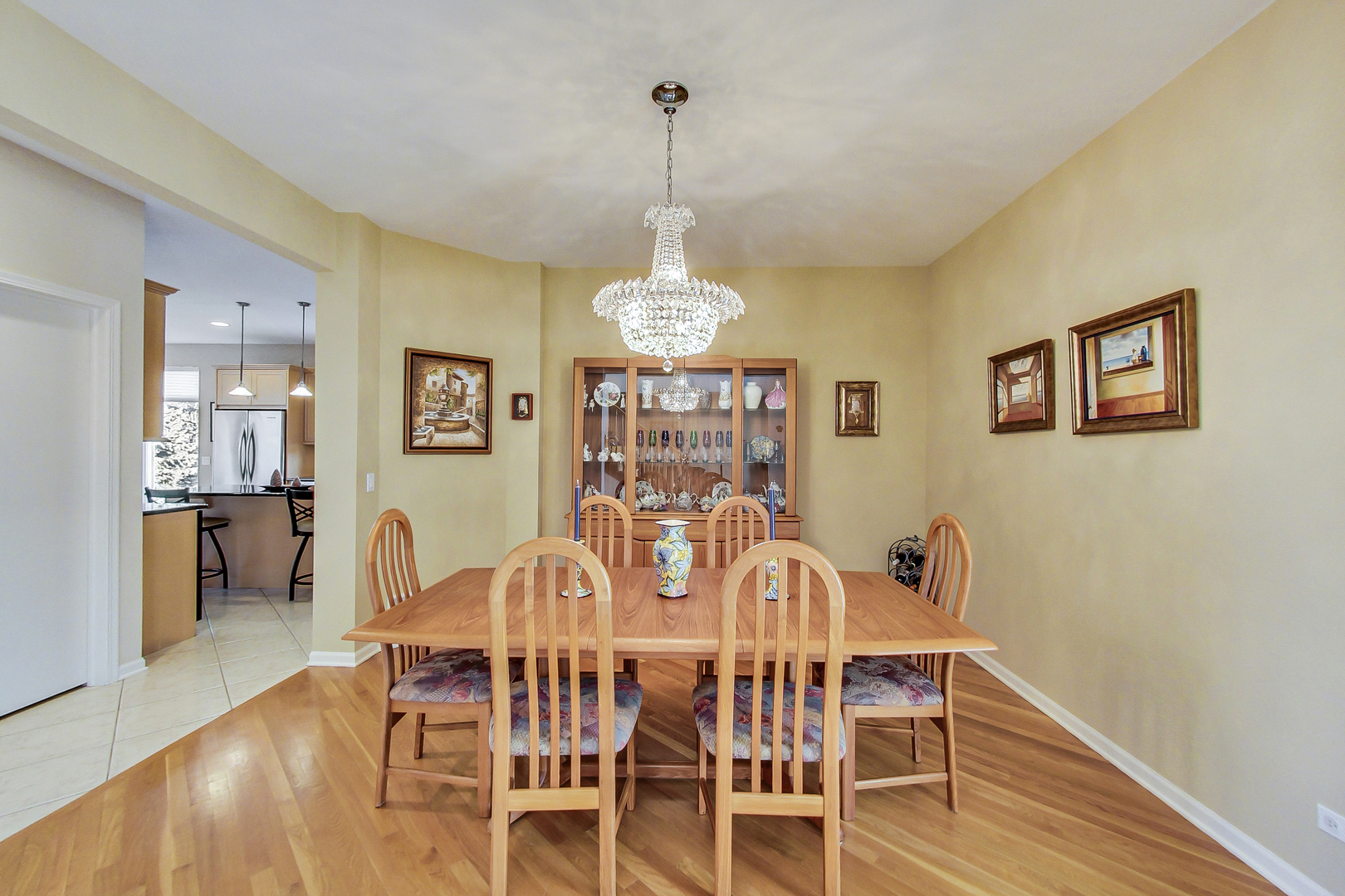 791 Endicott Road Highwood, IL 60040 - Photo 6 of 25 a view of a dining room with furniture wooden floor and chandelier