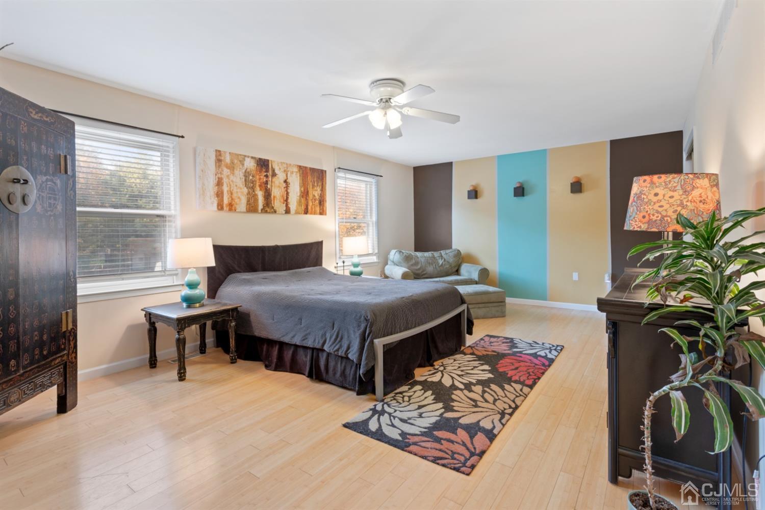 3 Rider Place West Windsor, NJ 08550 - Photo 16 of 33 a bedroom with a bed dresser flowerpot and window