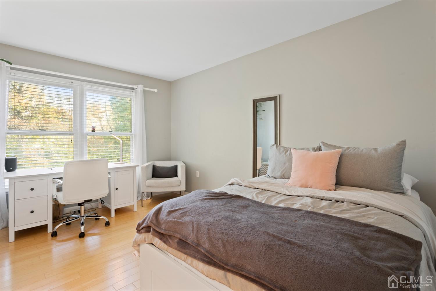 3 Rider Place West Windsor, NJ 08550 - Photo 22 of 33 a bedroom with a bed a large window and chair