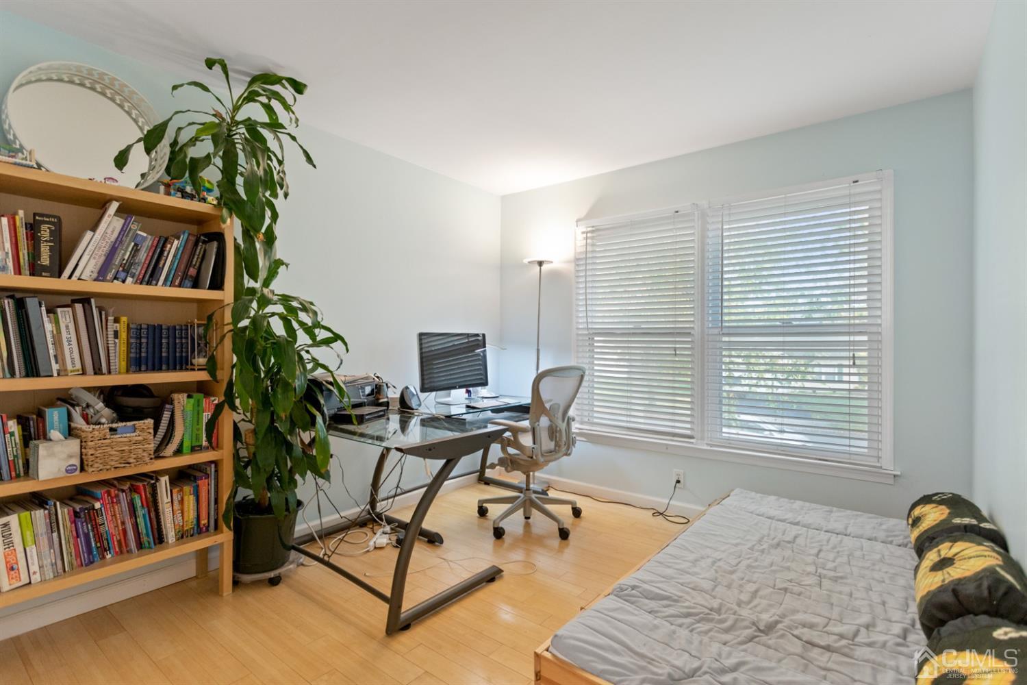 3 Rider Place West Windsor, NJ 08550 - Photo 24 of 33 a work room with furniture and a book shelf