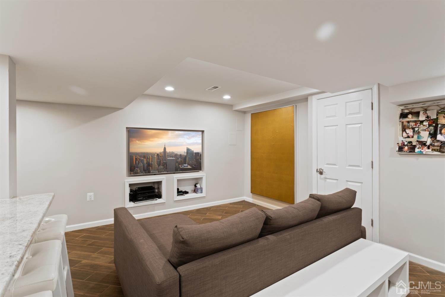 3 Rider Place West Windsor, NJ 08550 - Photo 27 of 33 a living room with furniture and a flat screen tv