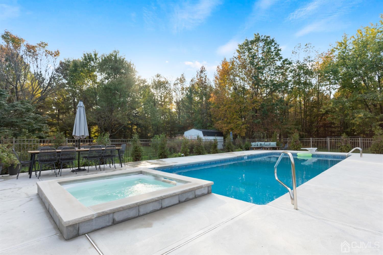 3 Rider Place West Windsor, NJ 08550 - Photo 30 of 33 a view of a swimming pool with a bench