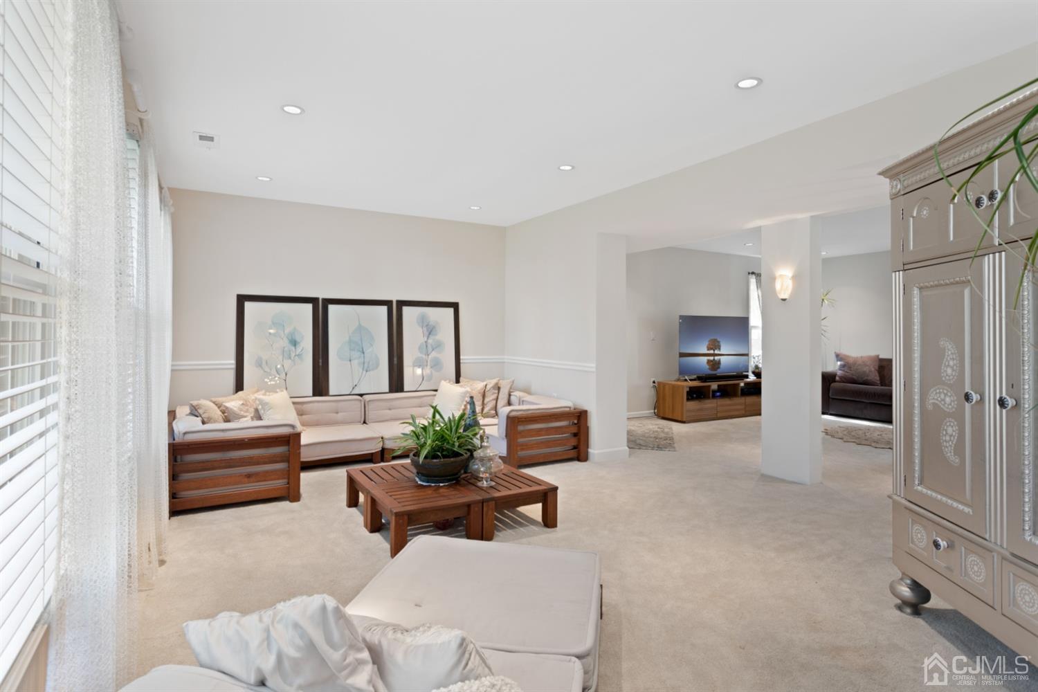 3 Rider Place West Windsor, NJ 08550 - Photo 4 of 33 a living room with furniture and a large window