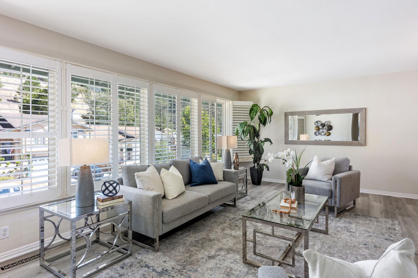 1063 Glacier Avenue Pacifica, CA 94044 - Photo 11 of 63 a living room with furniture and a large window