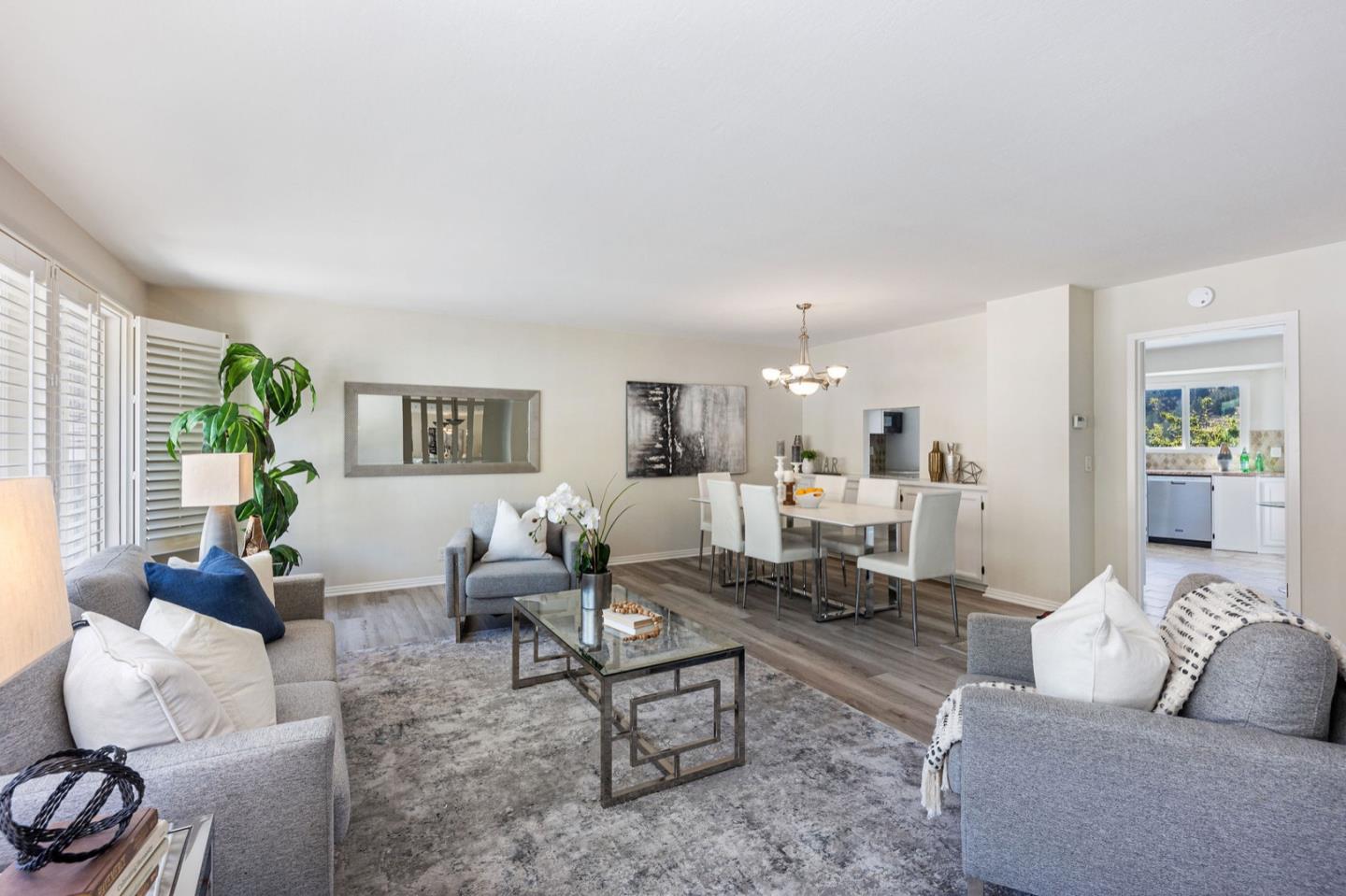 1063 Glacier Avenue Pacifica, CA 94044 - Photo 12 of 63 a living room with furniture and a large window