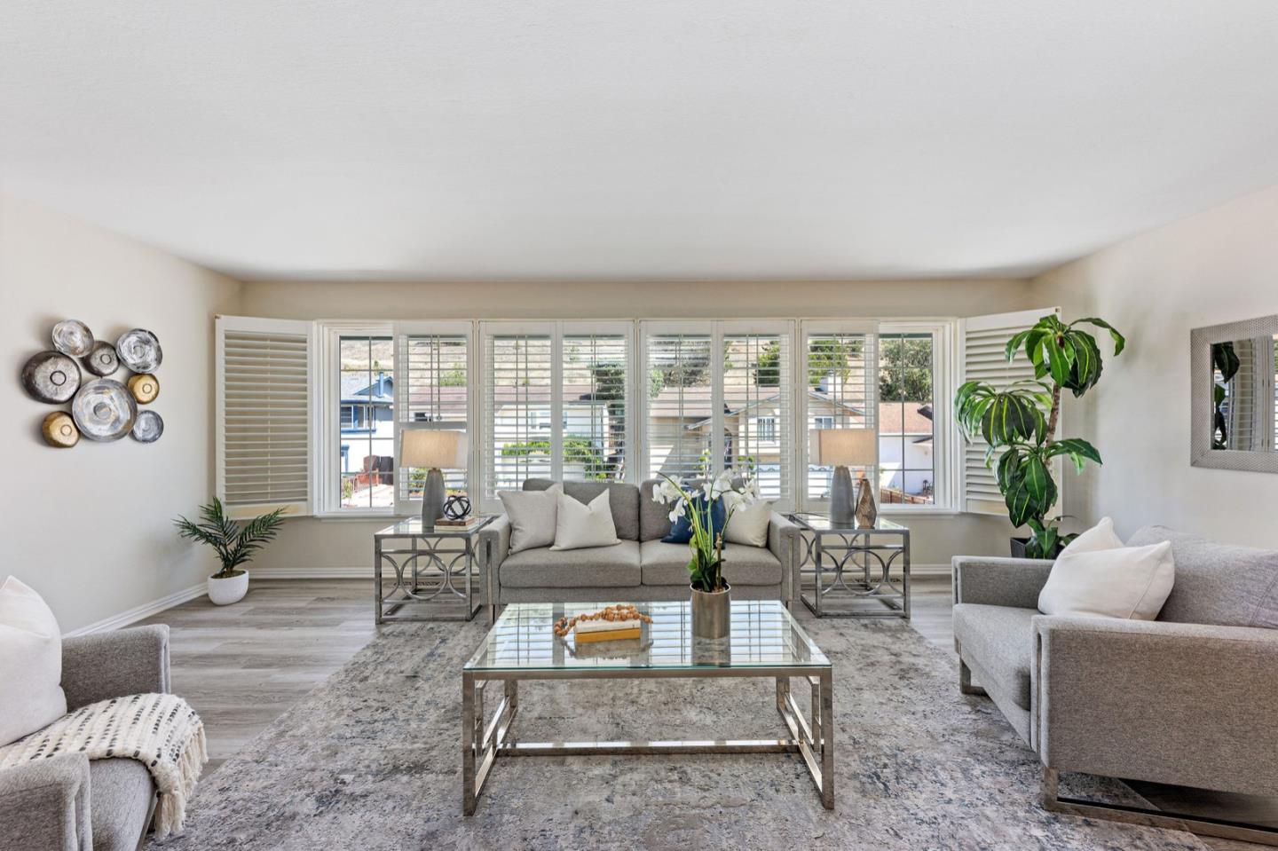 1063 Glacier Avenue Pacifica, CA 94044 - Photo 13 of 63 a living room with furniture and a large window