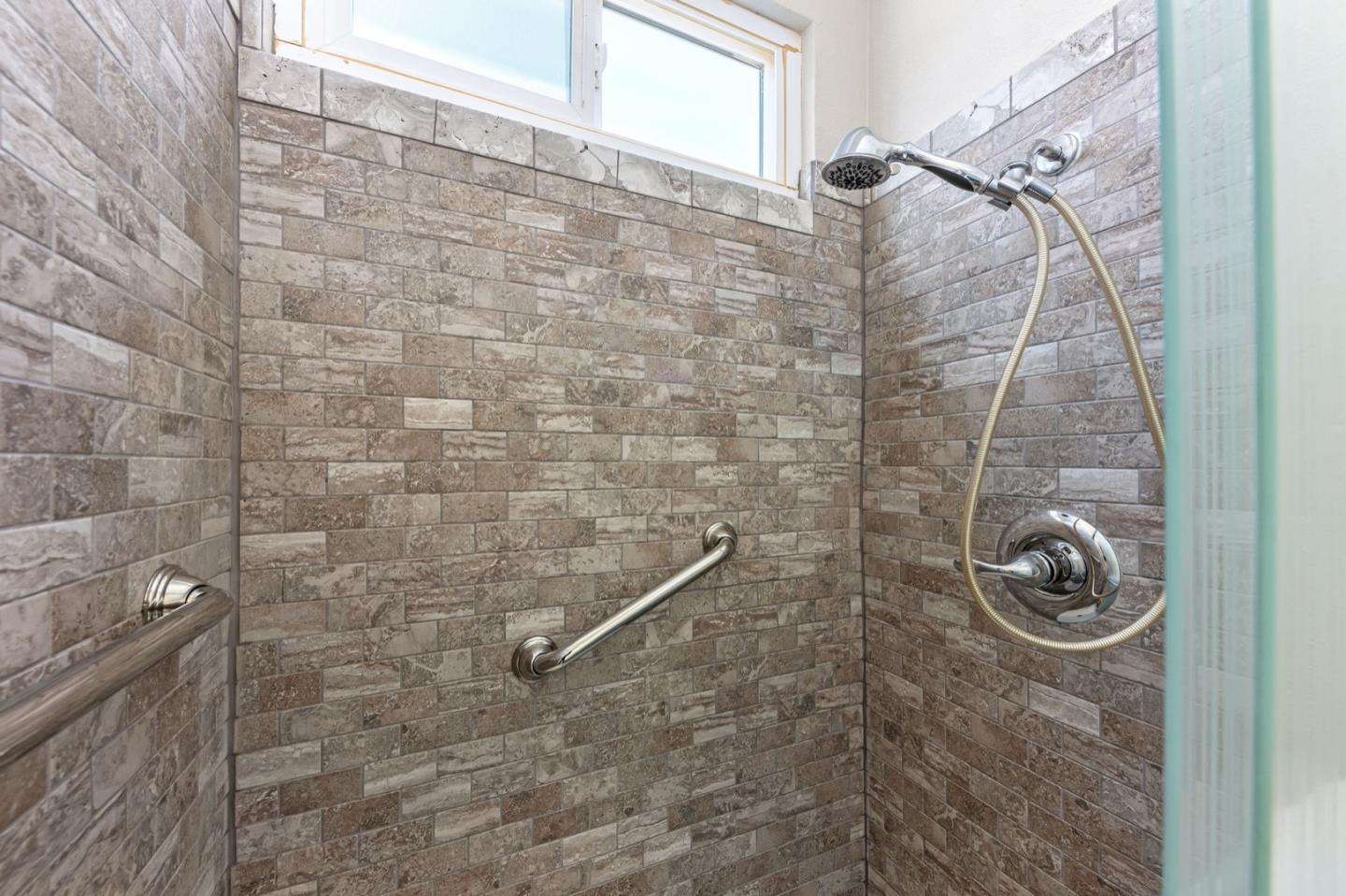 1063 Glacier Avenue Pacifica, CA 94044 - Photo 26 of 63 a bathroom with a shower