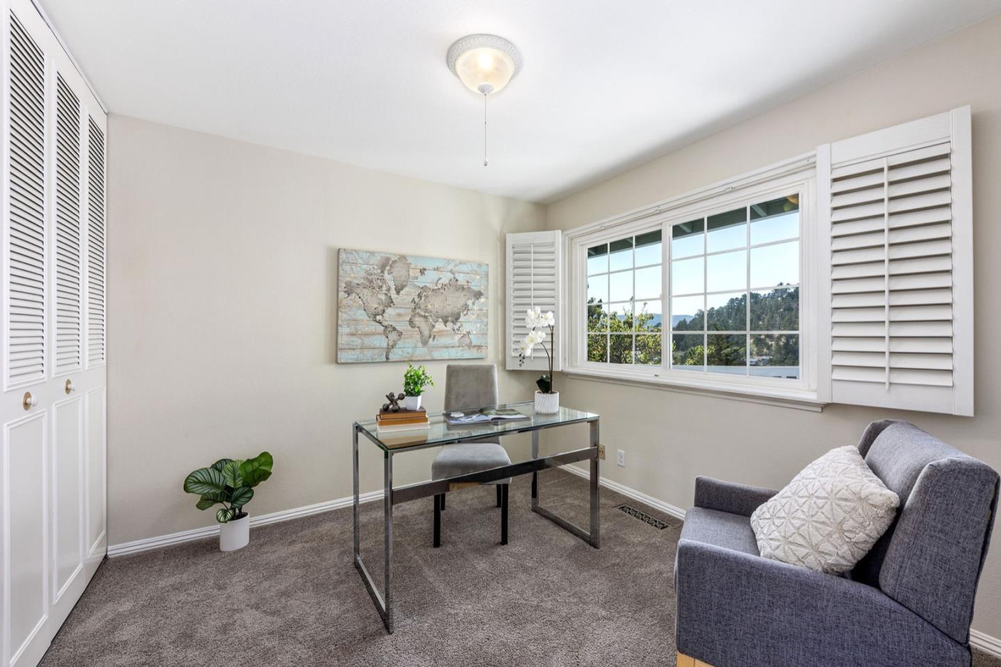 1063 Glacier Avenue Pacifica, CA 94044 - Photo 37 of 63 a living room with furniture and a window