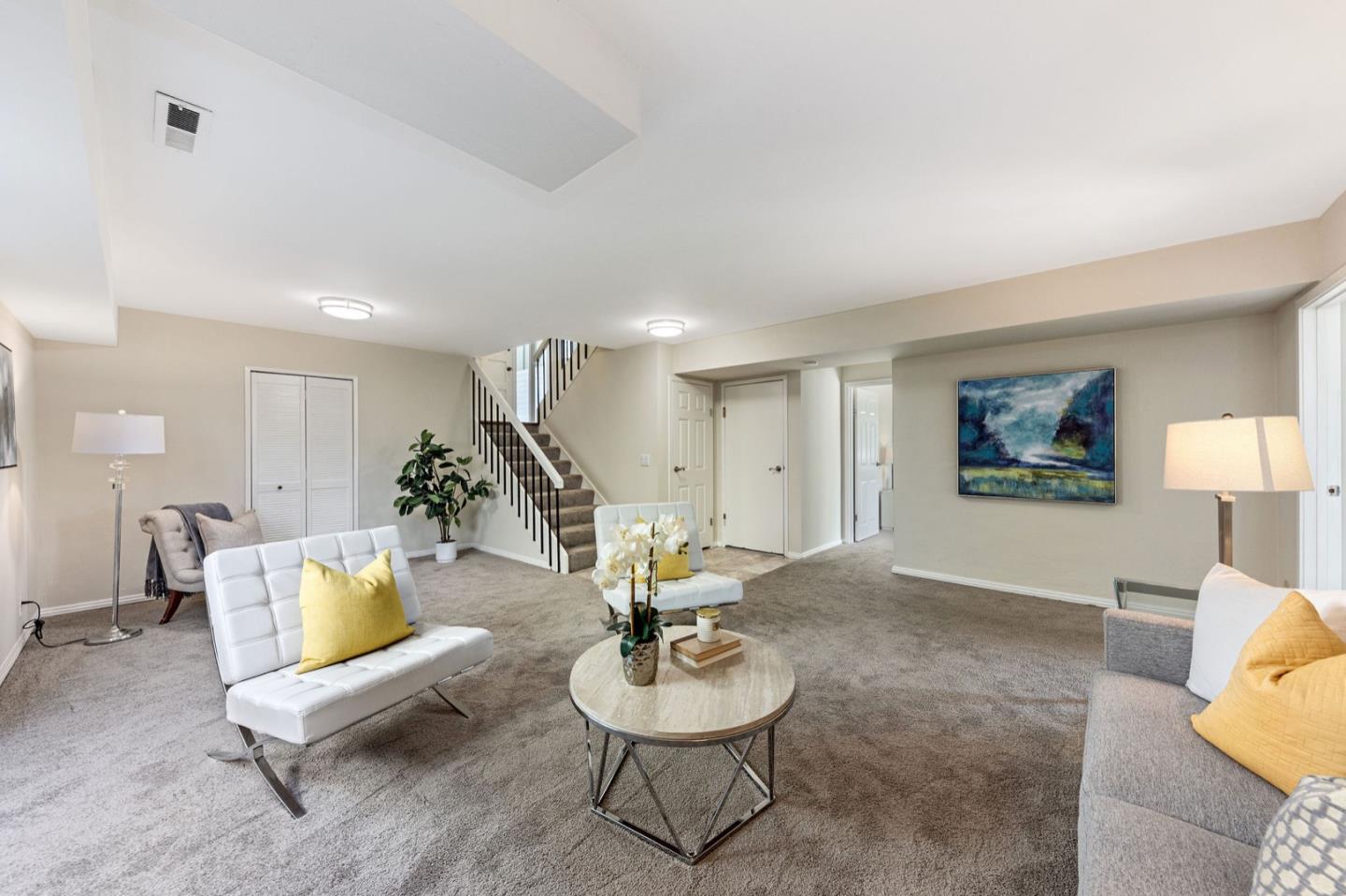 1063 Glacier Avenue Pacifica, CA 94044 - Photo 41 of 63 a living room with furniture and a couch