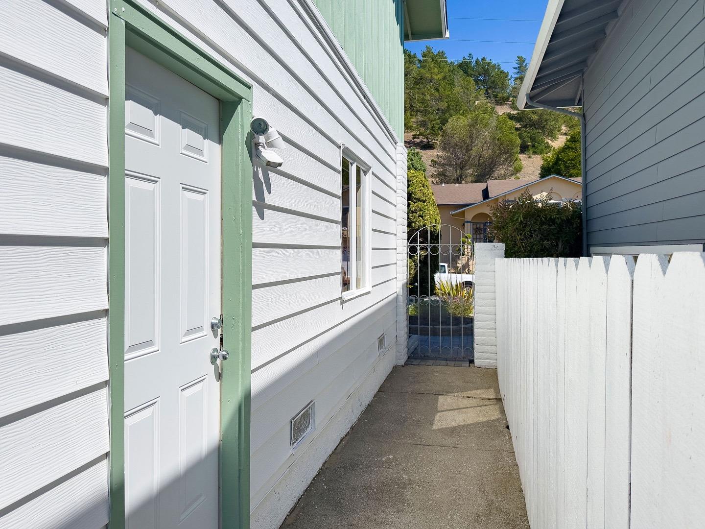 1063 Glacier Avenue Pacifica, CA 94044 - Photo 50 of 63 a view of a house with a porch