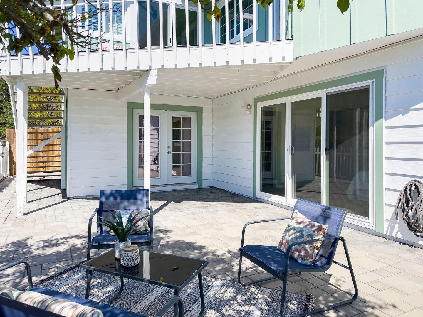 1063 Glacier Avenue Pacifica, CA 94044 - Photo 52 of 63 a view of a house with backyard and sitting area
