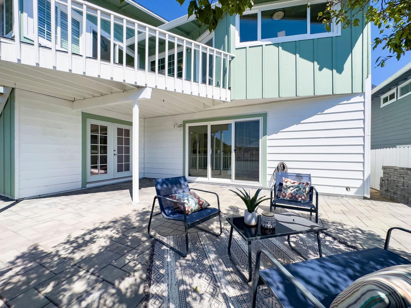 1063 Glacier Avenue Pacifica, CA 94044 - Photo 53 of 63 a view of a house with backyard and sitting area
