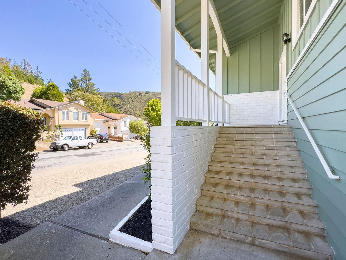 1063 Glacier Avenue Pacifica, CA 94044 - Photo 6 of 63 a view of entryway with wooden floor and a ocean view