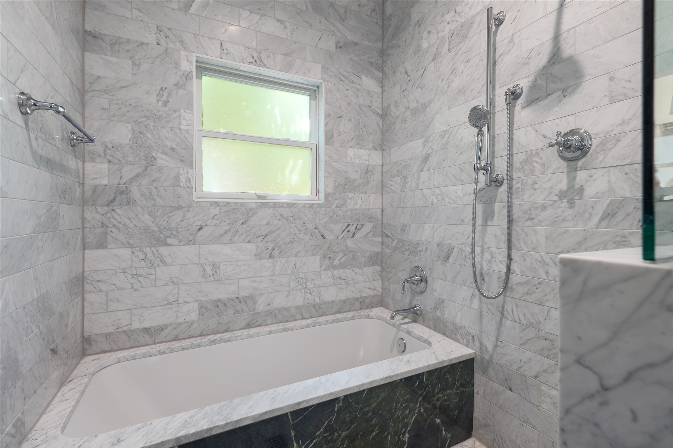 1701 Willow Street Austin, TX 78702 - Photo 23 of 29 a bath tub sitting next to a window