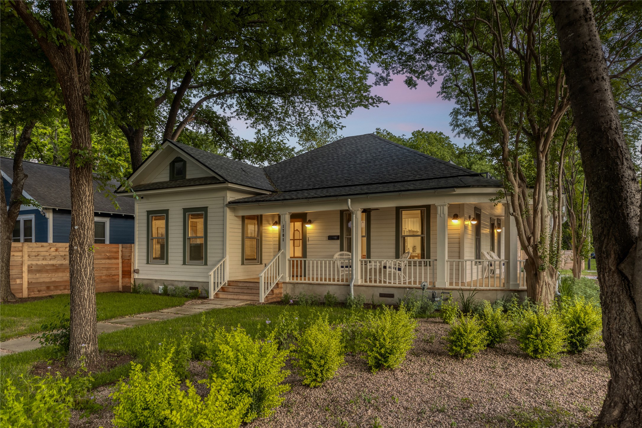 1701 Willow Street Austin, TX 78702 - Photo 3 of 29 a front view of a house with garden