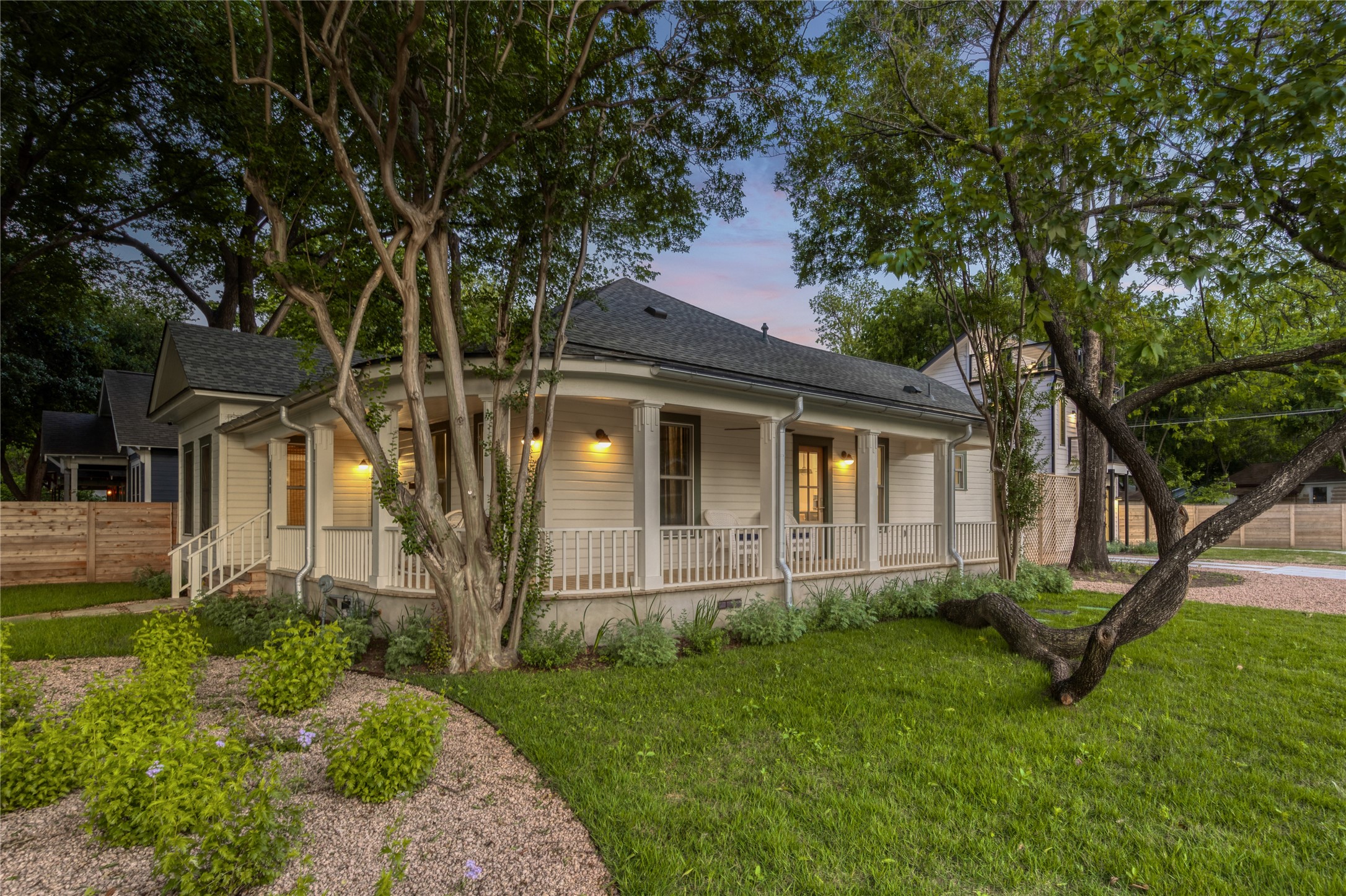 1701 Willow Street Austin, TX 78702 - Photo 6 of 29 a front view of a house with a yard