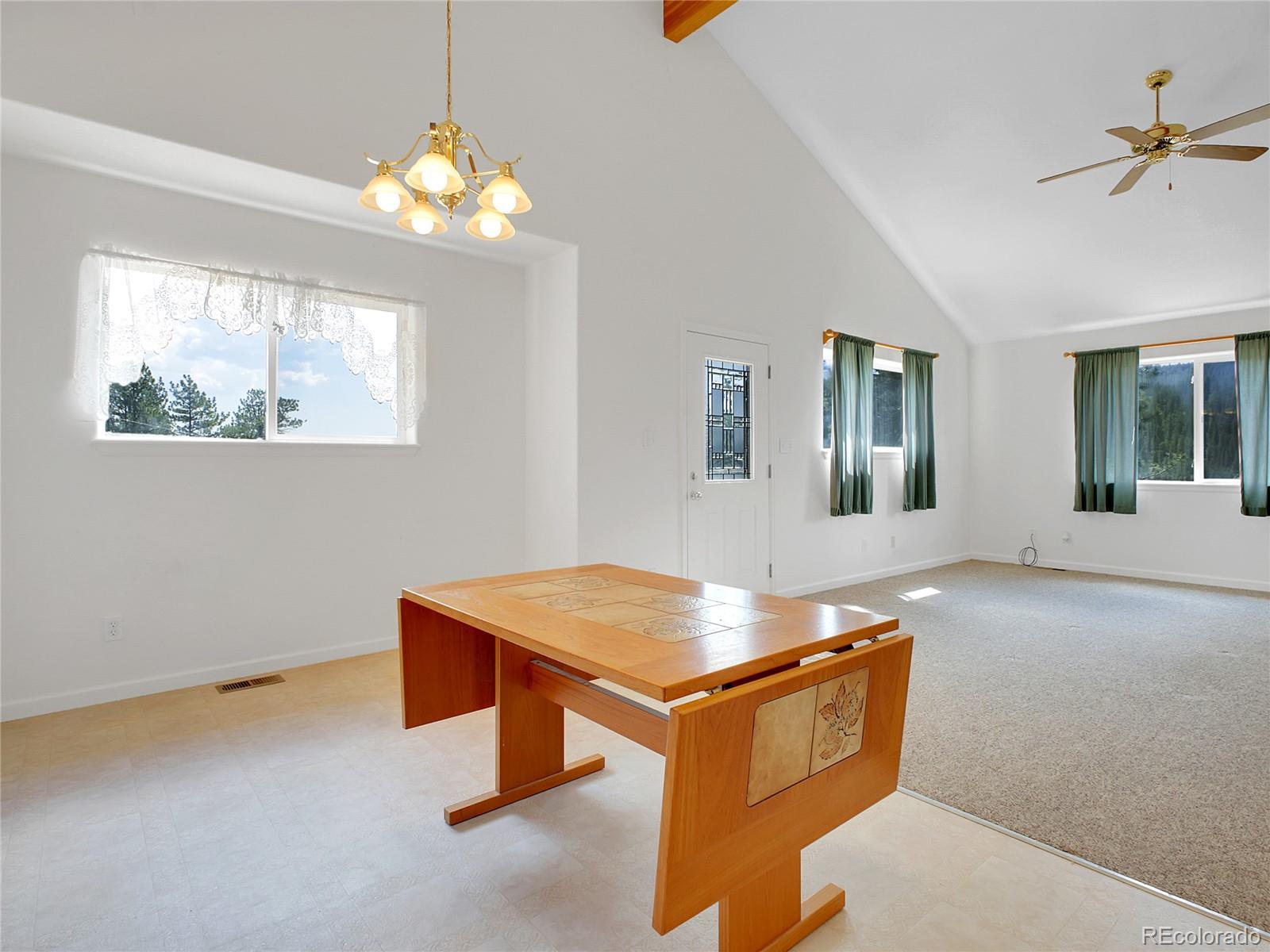 367 Moore Street Bailey, CO 80421 - Photo 13 of 32 a room with table and window