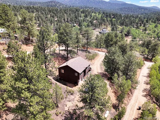 a view of a city with mountain