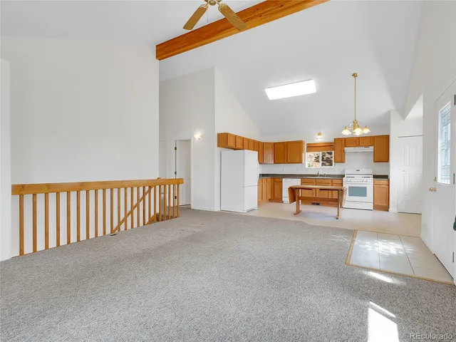 a view of kitchen with cabinets and stainless steel appliances