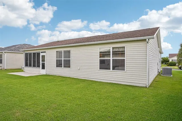 a view of a house with a garden